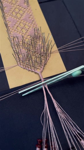 Finishing a Torchon lace bookmark 🧵✂️ #lacemaker #lacemaking #torchon #torchonlace #lace #handmade #crafts #bobbins #bobbinlace #pink #sew #sewing #crafttok #crafting #lacetok #thread #bobbins #craft #bobbinlacemaker #bobbinlacemaking