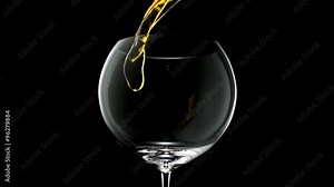 Pouring whiskey into glass shooting with high speed camera.