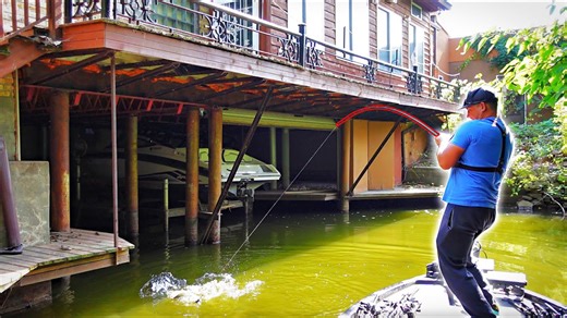 Big fish caught beneath abandoned creepy house stuns angler