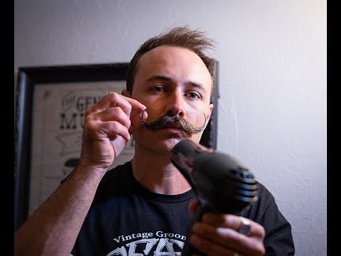 Owner of Death Grip Demonstrates How to Style a Handlebar Mustache Using Death Grip Wax
