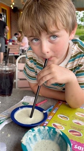 Drinking Chuys Creamy Jalapeño Dip with a Straw