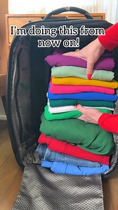 🧳 Pack clothing vertically to maximize space and make outfits easily accessible in your suitcase! #traveltips #vacationmode #organization #luggage #airport | Jeff & Lauren