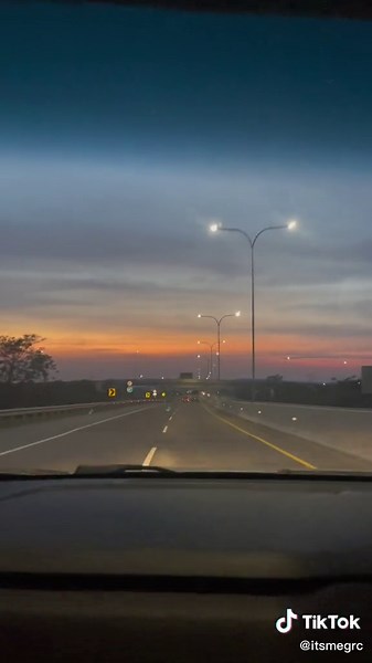 Scenic Sunset Drive on a Multi-Lane Highway