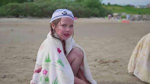Little Girl Sitting on the Beach, Hot Summer Day. Stock Footage - Video of happiness, panoramic: 120117678