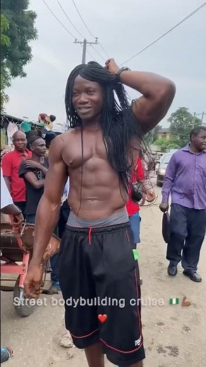 Big shirtless black muscle boy in the streets #fitness #subscribe #streetbodybuilder