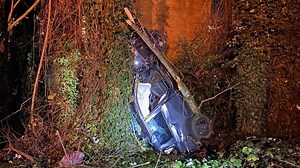 Driver unharmed after 40-foot fall off I-5 ramp in Seattle