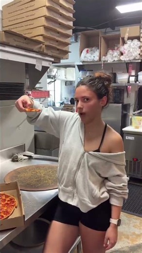 Pizza girl with another pepperoni cut. Sizzling best bar pie in Florida!! #pizza #floridafoodie