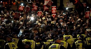 Million Mask march: scores arrested after clashes between police and protesters