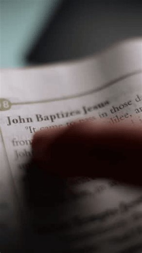 clip-3979835603-close-finger-following-text-while-reading-passage