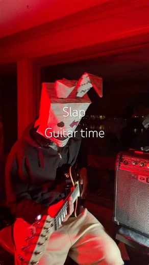 Slapping guitar.