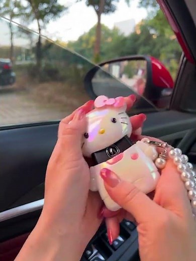 Transform your car keys into an adorable kitten instantly! Super cute cartoon cat key cover