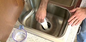 How to Fix a Clogged Kitchen Garbage Disposal - Today's Homeowner