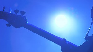 Bass guitar player performing on stage - Free Stock Video