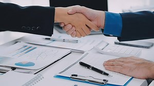 Download Teamwork executives colleagues business people handshake after meeting for free