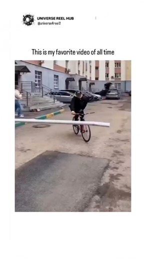 Universe4Reel2 😂 | Viral Reels on Instagram: "The video depicts a cyclist in neon gear riding through a snowy urban parking lot, using a long white pole held horizontally to lift an automatic barrier gate overhead without stopping. Shared by @ViralityClips as their all-time favorite, the clip highlights everyday ingenuity and has received modest engagement with 39 likes and 4,589 views since posting yesterday. One reply claims it's Al-generated, consistent with 2026 trends in deepfake videos mi