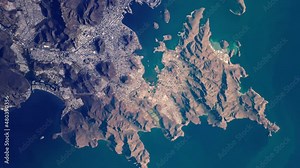 Mexico coast line mountains and city of Guaymas on gulf of California, sunrise animation aerial satellite view from space. Based on image by Nasa