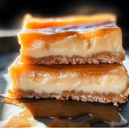 Decadent Caramel Cheesecake Bars Ingredients: For the crust: 1 1/2 cups graham cracker crumbs 1/4 cup granulated sugar 1/2 cup unsalted butter, melted For the cheesecake filling: 16 oz cream cheese, softened 1/2 cup granulated sugar 1 teaspoon vanilla extract 2 large eggs For the caramel topping: 1 cup caramel sauce (store-bought or homemade) Sea salt, for sprinkling (optional) Directions: Preheat the oven to 325°F (163°C). Line an 8x8 inch baking pan with parchment paper, leaving an overhang fo