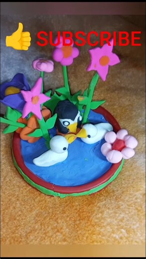 A small duck pond made of clay. Subscribe if you love cute clay art! #Shorts