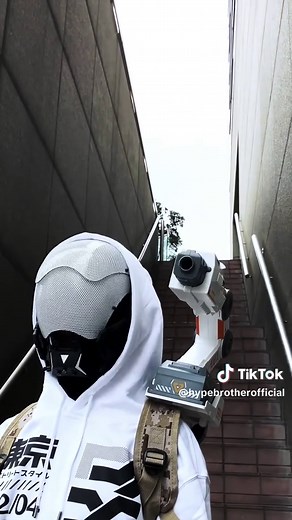 Introducing the Mecha Robot Arm — the first head & hand motion tracking robotic cannon wearable with shoulder mount and remote control. The Robot Arm Tracking Blaster is a wearable blaster that combines realtime motion-tracking technology with EVA or hydrogel projectile play. Built around an intelligent robotic arm, the cannon responds to head movement or hand gestures, adjusting its direction in realtime for a natural aiming experience where looking toward a target is all it takes to align the