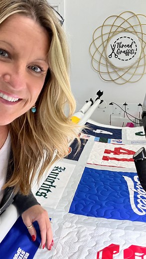 Today I’m working on a quilt emergency ‼️ (Yes those are a real thing) 🤣😜 My local quilty friend Linda watched my YouTube videos on “How to make a TShirt Quilt”, and she did so great that it ended up WAY to big and heavy to quilt on her domestic (80”x145”) so I’m helping her out! We are trying to finish for Graduation 👩‍🎓 so I un-basted it, and loaded the #shannonminky then left the batting and shirts glue basted, and started some simple freehand meandering. There are some very thick spots, 