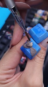 125K views · 5.4K reactions | Movie inspired micro art on light-up computer keyboard  Sculpting a cute miniature movie inspired character. Featuring a fiber optic floating flame on a mini candle, along with adorable details to set the mood. | Temika S | Facebook