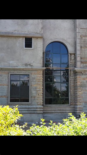 Modern Dark-Framed Glazing: Kenya Home Window Installation