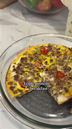 3 eggs, ground beef, cottage cheese, your favorite toppings, on a flour tortilla!
