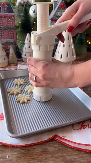 Black Pepper, Parmesan & White Cheddar Spritz Crackers for Day 14 of our Recipe Advent Calendar! 🎄 If you have a spritz cookie press sitting in your cabinet that only gets used once a year, these cheesy crackers will put it to good use! They’re crisp and cheesy, with the perfect peppery kick. I would describe the texture as somewhat in between a savory cookie and cracker! (If you’ve ever had a cheese straw, that’s essentially what these are 😉) This recipe makes a very large batch, which is per
