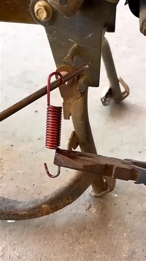 Installing a Motorcycle Side Stand Spring.