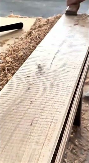 Quickly shaving a wooden board using a portable planer makes the wood smoother #woodworking #popular