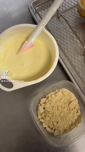 Should I have a Cookie or a Cupcake? How about both! 🧁🍪 Sugar Cookie Cupcakes in the making this morning. A cupcake loaded with sugar cookie peices then dipped into white chocolate and sugar cookie crumbs and topped with bright pink vanilla buttercream 😍 | OMG Cupcakes Grande Prairie