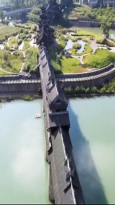 Built over the Apeng River in the ancient town of Zhuoshui in southern China's Chongqing, the 658-meter-long and 5-meter-wide Feng Yu Qiao ("Wind and Rain Bridge") is the longest of its kind in Asia. Its style embodies the architectural art of the Tujia and Miao ethnic groups who inhabit this region. #FunChina #LensofChina | China Plus Culture