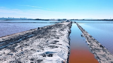 clip-4005382029-industrial-path-salt-piles-evaporation-ponds-facility