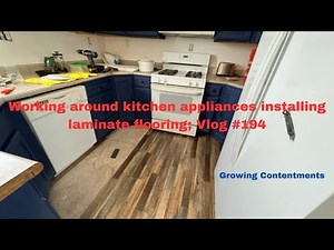 Working around kitchen appliances installing laminate flooring; Vlog #194