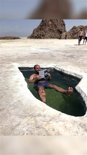 Danakil Depression and Dallol, Lake Asale (Karum), Danakil Dallol in the Danakil Desert is one of the lowest places on earth at 116 meter below sea level, where lakes of acid form colorful sulfur formations in the hottest and deepest part of the Danakil depression where salt is excavated, cut into slabs and loaded on to caravans of camels. Volcano Erta Ale is globally recognized as one of the most alluring and yet physically challenging natural attractions. Its base is 30 kms diameter and 1 km s