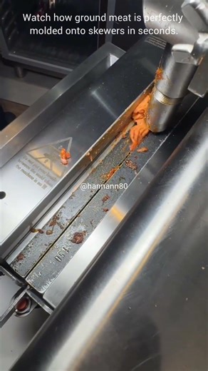 Watch how ground meat is perfectly molded onto skewers in seconds.#like #follow #subscribe