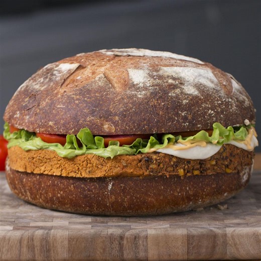 36K views · 85 reactions | Go big or go home with this giant veggie burger that has four veggie burgers in one! See and shop the recipe: https://tasty.co/buy/giant-veggie-burger | Tasty Vegetarian | Facebook