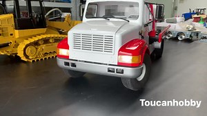 1/10 CROSS RC WT4 road rescue truck with screw unloading flatbed, it’s all kit unpainted and unassembled,l original, only with motor, lights , one two-speed transmission , now we already painted and built to RTR version , has been upgraded with sound and lighting system for it, size: 778*297*271mm, wheelbase: 445mm, flatbed length: 520mm, flatbed width: 279mm | Toucanhobby