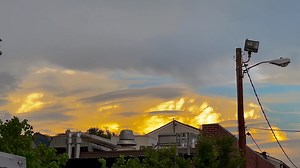 07/28/23 - Atlanta : Georgia 🇺🇸 After the storms on Friday this spectacular formation caught my attention… It was massive in size and contained vivid hues of gold. What I found to be really interesting was the fact it was surrounded by several dark lenticular clouds. They looked like a flotilla of cloud ships guarding a golden fortress… Here’s what I was able to capture. 😎 #alienskies | Alien Skies
