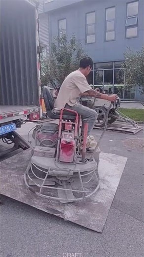 Smooth! Worker Drives Floor Leveler Off Truck – Ready to Prep Floors!#shorts