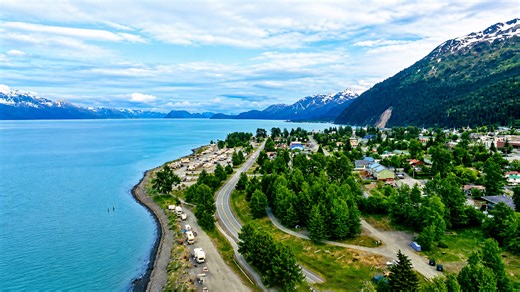 Rugged mountains meeting the ocean in Seward Alaska