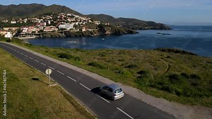 Aerial fly over of the the final stretch of Mediterranean coastline in France - Côte Vermeille in the south of France just before the boarder with Spain