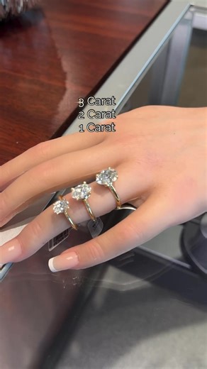 Ever wondered what different carat sizes actually look like side by side? Check out our 1ct, 2ct & 3ct diamond rings stacked up next to each other, each one stunning in its own way ✨💎 Whether you’re dreaming big or keeping it classic, we have gorgeous options in every size, every style, and every budget. Come try them on and see what feels like you. 💍 | Diamond Gallery