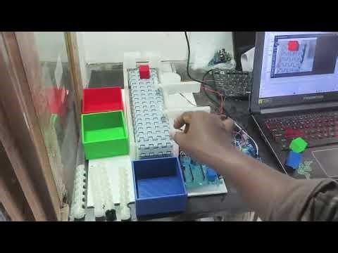 Automatic sorting system using robotic arm