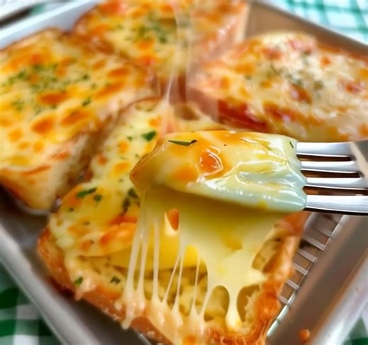 🧀 Creamy Garlic Cheese Toast 🥖✨ If melty, golden cheese and buttery garlic make your heart happy — this recipe’s your new go-to! 😍 Crispy on the edges, soft inside, and dripping with creamy, garlicky goodness. Everyone in the family will beg for seconds (and thirds!). 💬 Get the Full Recipe 👇 (check c.o.m.m.e.n.t) 📌 Hashtags: #GarlicCheeseToast #EasyAppetizer #CheesyGoodness #FamilyFavorite #TastyToobo | Cooking Recipes