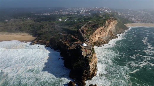 Surfing Nazaré’s Sky-High Swells: A Soaring Drone Adventure - Worldwide