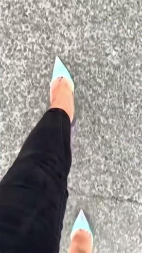 Walking in Christian Louboutin So Kate high heels