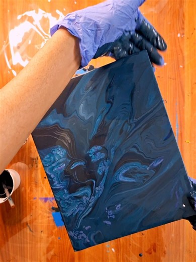 Deepest oceanic trench on Earth, reflecting the pouring, deep blue, Green & Silver, black & colors.