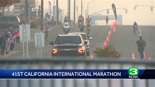 Runners cross the finish line at the 2024 California International Marathon