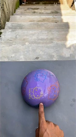 Experiment: Dropping a purple water balloon from the top of the stairs—will it burst?